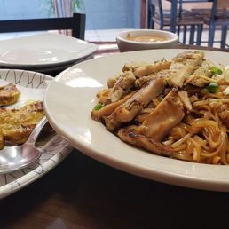 Pad Thai with Lemongrass chicken (right), Chicken Satay with Cucumber Salad and Peanut Sauce (left) Pad Thai with Lemongrass chicken (right), Chicken Satay with Cucumber Salad and Peanut Sauce (left)