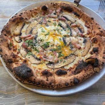 Rigo - Pizza bismark - pancetta, portabrlla mushroom, egg (our version is minus truffle oil) - Spanish Near Me - Honolulu, Hawaii Rigo - Pizza bismark - pancetta, portabrlla mushroom, egg (our version is minus truffle oil) - Spanish Near Me - Honolulu, Hawaii