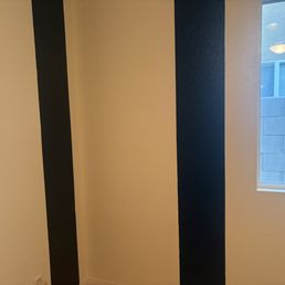 white walls with blue stripes (not good lighting) white walls with blue stripes (not good lighting)
