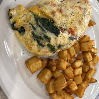 Park Place Cafe - Egg white omelette, substituted cheddar cheese instead of feta with pinenuts basil spinach tomatoes Yum - Breakfast & Brunch Near Me - Milwaukee, Wisconsin