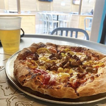 Mario's East Side Saloon - Pizza topped with Sausage and Banana Peppers - Sports Bars Near Me - Pittsburgh, Pennsylvania