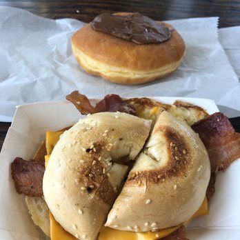 Dimo's Deli and Donuts - Bacon, egg, and cheese on a garlic bagel - Delis Near Me - Ann Arbor, Michigan Dimo's Deli and Donuts - Bacon, egg, and cheese on a garlic bagel - Delis Near Me - Ann Arbor, Michigan