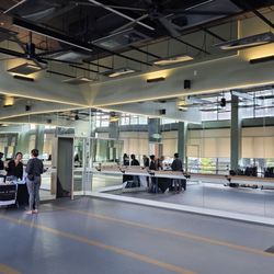 Be Yoga - A medium sized interior, almost similar to a cozy ballet classroom. Modern, full of mirrors. Designed to get some work done!