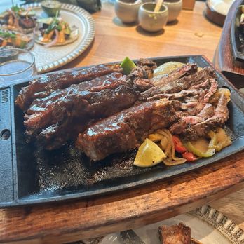VERDAD True Modern Mexican - Prime steak fajita and ribs board, the onions delicious!!! - Mexican Near Me - Austin, Texas VERDAD True Modern Mexican - Prime steak fajita and ribs board, the onions delicious!!! - Mexican Near Me - Austin, Texas
