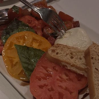 The Capital Grille - Burrata with Heirloom Tomatoes - Steakhouses Near Me - Denver, Colorado The Capital Grille - Burrata with Heirloom Tomatoes - Steakhouses Near Me - Denver, Colorado