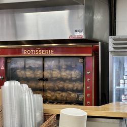 The Barcelona Burger And Beer Garden - Rotisserie chickens in the making