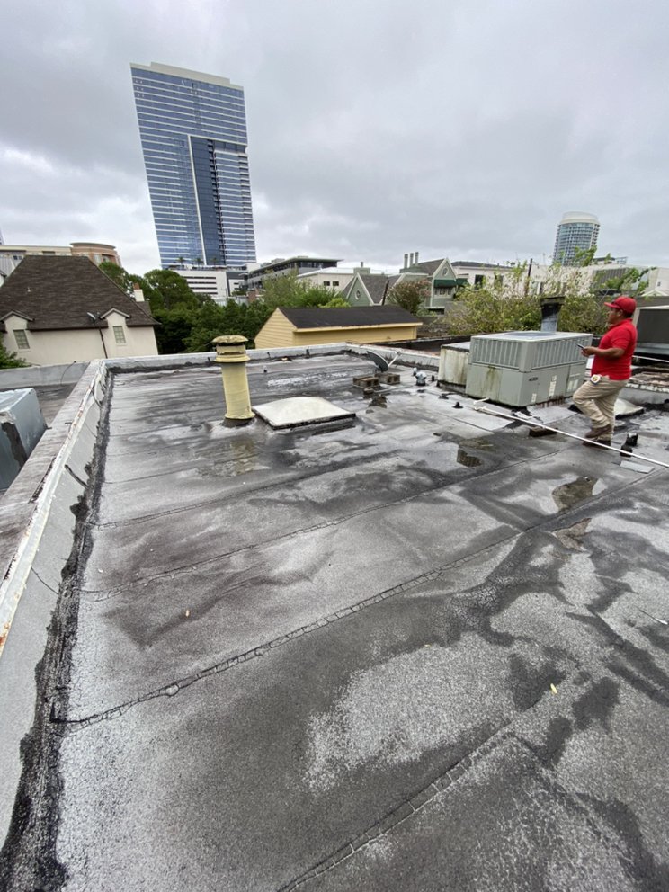 Slide of Quality King Roofing