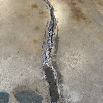Angel's Paint & Epoxy - Largest crack was 2" wide - Flooring Near Me Angel's Paint & Epoxy - Largest crack was 2" wide - Flooring Near Me