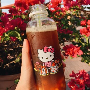 Hello Kitty Cafe - Passion fruit iced tea with popping boba - Cafes Near Me - Irvine, California