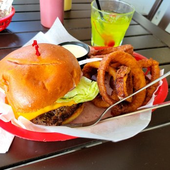 River View Grill & Bar - Cheeseburger and onion rings with a Midori Sour - Bars Near Me - Three Rivers, California River View Grill & Bar - Cheeseburger and onion rings with a Midori Sour - Bars Near Me - Three Rivers, California