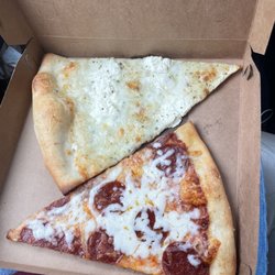 White pizza slice and pepperoni pizza slice