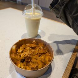 Major Joy Flavoured Chicken - Butter chicken poutine and Mango milkshake