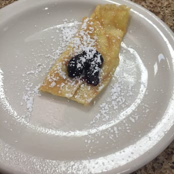 Eggs N Things - Complimentary little custard filled with jam and powdered sugar on top. So delicate and delicious :) - Breakfast & Brunch Near Me - Valencia, California Eggs N Things - Complimentary little custard filled with jam and powdered sugar on top. So delicate and delicious :) - Breakfast & Brunch Near Me - Valencia, California