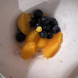 Picking some the mandarin oranges and blueberries out to rinse and put in my own bowl and I am surprised by corn kernels. Picking some the mandarin oranges and blueberries out to rinse and put in my own bowl and I am surprised by corn kernels.