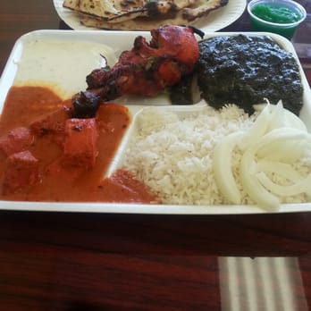 Namaste Indian Kitchen - Saag paneer, chicken tikka masala, tandoori chicken, rice, garlic naan and yogurt sauce. - Indian Near Me - Riverside, California Namaste Indian Kitchen - Saag paneer, chicken tikka masala, tandoori chicken, rice, garlic naan and yogurt sauce. - Indian Near Me - Riverside, California