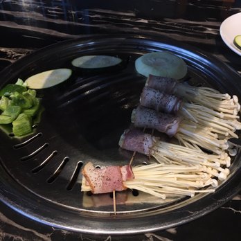 Ombu Grill - Mushrooms wrapped with pork belly. - Korean Near Me - Orem, Utah Ombu Grill - Mushrooms wrapped with pork belly. - Korean Near Me - Orem, Utah