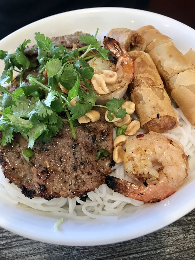 Vermicelli with lemongrass beef, egg rolls, and grilled shrimp Yelp