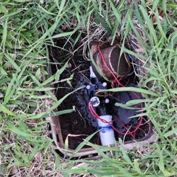 Maui Specialty Movers - Bleeding air out of the system on New irrigation valve.