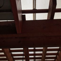 Gap in covering causes water to leak down to cement porch. Gap in covering causes water to leak down to cement porch.