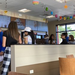 Dunkin' - One masked customer.