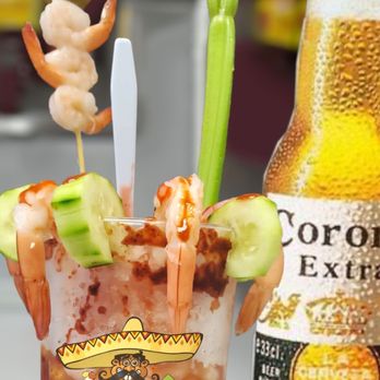 Mexicanisimo's snack - a bloody drink with shrimp and celery - Gelato Near Me - Naples, Florida Mexicanisimo's snack - a bloody drink with shrimp and celery - Gelato Near Me - Naples, Florida
