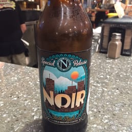 Buy beer from the fridge and enjoy at the bar.
