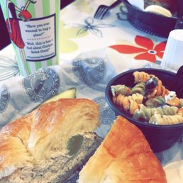 a sandwich with a side of macaroni and cheese