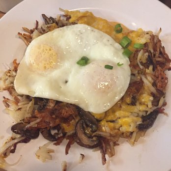 Seven Mile Cafe - Loaded potatoes with over medium eggs with bacon and mushrooms - Breakfast & Brunch Near Me - Keller, Texas