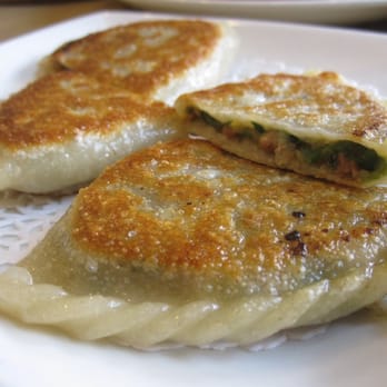 Xiao Long Bao - Pan fried dumplings with minced beef and Chinese leeks. - Dim Sum Near Me - Markham, Ontario Xiao Long Bao - Pan fried dumplings with minced beef and Chinese leeks. - Dim Sum Near Me - Markham, Ontario