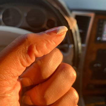 DKM Nails - Bulky nail, not smooth and paint isn't even covering edge - Nail Salons Near Me - Houston, Texas