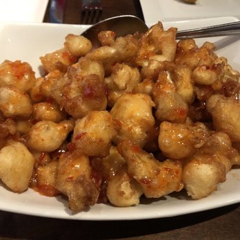 Ideal Tavern - Cauliflower Popcorn with sweet and slightly spicy chilli drizzle - New American Near Me - Southington, Connecticut Ideal Tavern - Cauliflower Popcorn with sweet and slightly spicy chilli drizzle - New American Near Me - Southington, Connecticut