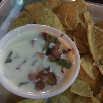 Tannery Row Ale House - Nacho and cheese dip with pico for $12. - Wine Bars Near Me - Buford, Georgia Tannery Row Ale House - Nacho and cheese dip with pico for $12. - Wine Bars Near Me - Buford, Georgia