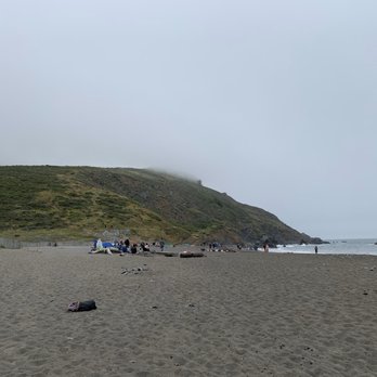 Muir Beach - Beach with a hill partially in fog/a cloud. - Parks Near Me - Muir Beach, California Muir Beach - Beach with a hill partially in fog/a cloud. - Parks Near Me - Muir Beach, California
