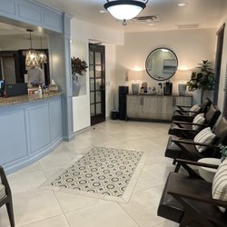 Phoenix Dental Design - Reception area with coffee bar and magazines.
