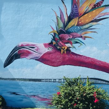 Chairs For Affairs - Beautiful flamingo with pineapple top - side of building - Party Equipment Rentals Near Me - Melbourne, Florida Chairs For Affairs - Beautiful flamingo with pineapple top - side of building - Party Equipment Rentals Near Me - Melbourne, Florida