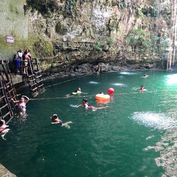 Cenote Ik Kil - Stair to get in and out of Cenote Ik Kil - Landmarks & Historical Buildings Near Me - Tinum, YUC