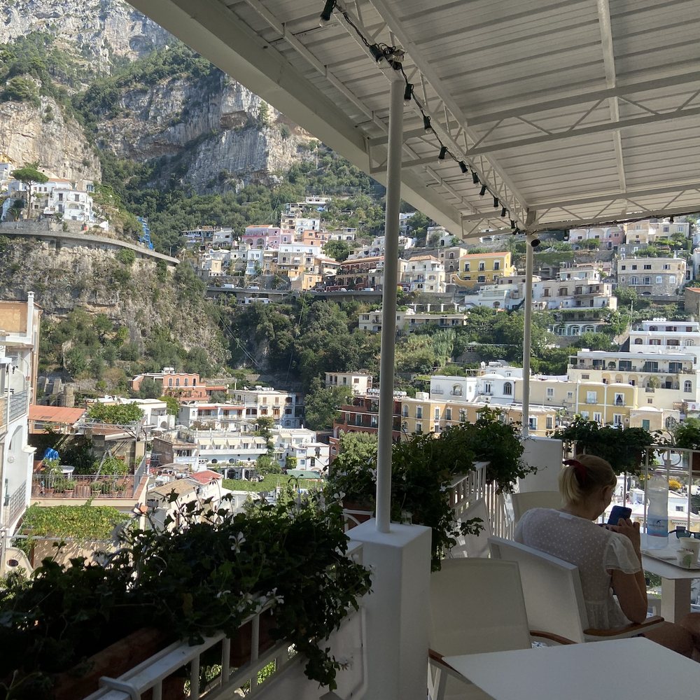 Latteria - Outdoor seating with a view. - Convenience Stores Near Me - Positano, SA Latteria - Outdoor seating with a view. - Convenience Stores Near Me - Positano, SA