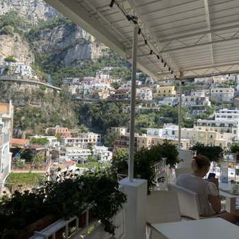 Latteria - Outdoor seating with a view. - Convenience Stores Near Me - Positano, SA Latteria - Outdoor seating with a view. - Convenience Stores Near Me - Positano, SA