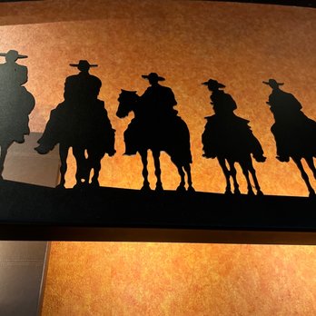 LongHorn Steakhouse - silhouettes of cowboys on horseback - Steakhouses Near Me - Tampa, Florida LongHorn Steakhouse - silhouettes of cowboys on horseback - Steakhouses Near Me - Tampa, Florida