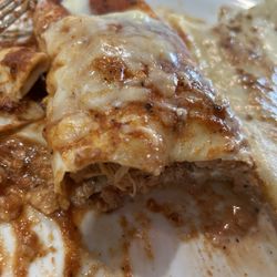 Los Poblanos - Chicken enchilada . Tender, great flavor .