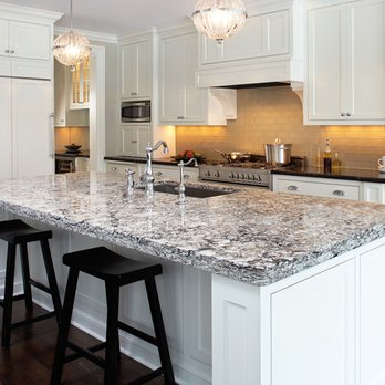 KDK by Design - a kitchen with a large island - Cabinetry Near Me - Monticello, Illinois KDK by Design - a kitchen with a large island - Cabinetry Near Me - Monticello, Illinois