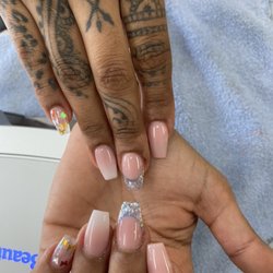 Sun 'n Nails - Under new management