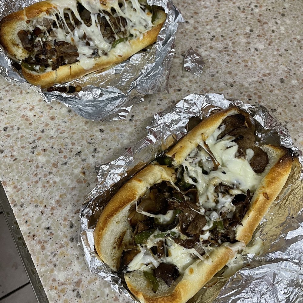Brick Oven Pizzeria - Dual Philly Cheese Steaks - Pizza Near Me - Lake Placid, Florida