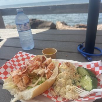 JMK Fish Mart - Lobster roll with potato salad, yummy! - Seafood Near Me - Summerside, Prince Edward Island JMK Fish Mart - Lobster roll with potato salad, yummy! - Seafood Near Me - Summerside, Prince Edward Island