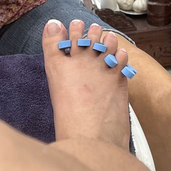 Pamper Me Nails & Spa - French tip from pampered nails ....I've seen so much better. Don't judge my feet please. I'm just a girl who wanted to treat myself for once - Nail Salons Near Me - Hesperia, California