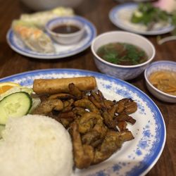Pho T-Q Restaurant - Rice plate with chicken, lettuce and cucumber, lettuce. additional spring rolls