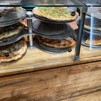 Wiseguy Pizza - a display of pizzas - Pizza Near Me - Washington, DC, District of Columbia
