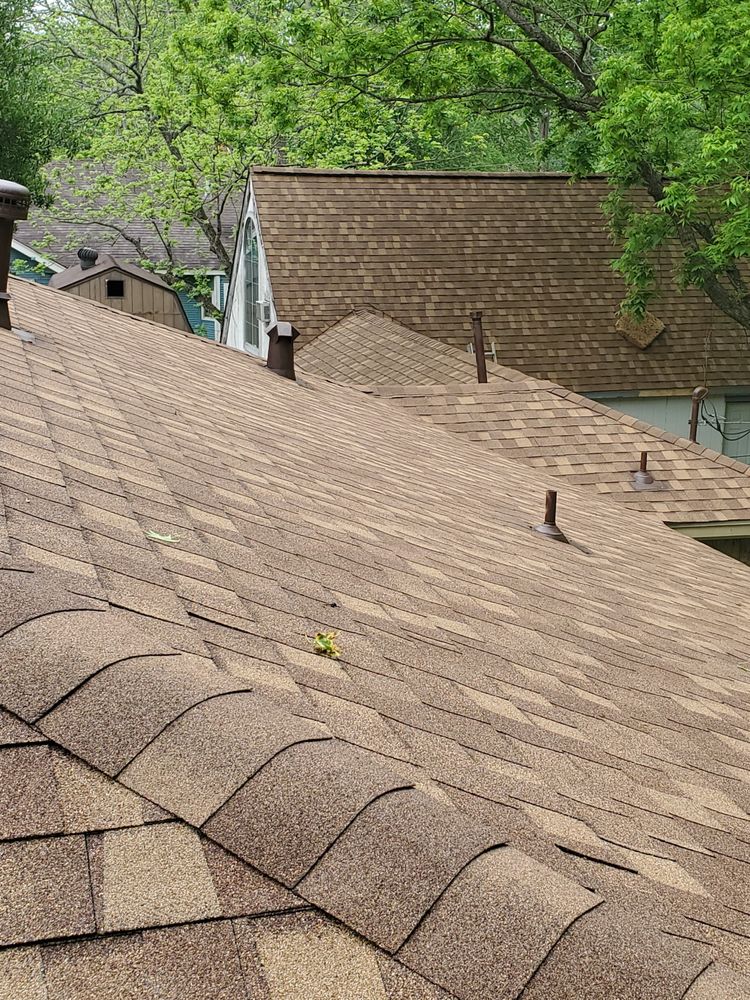 Slide of Reveille Roofing