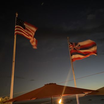 Fleetwood's on Front St - Flags on the rooftop a Fleetwoods. - New American Near Me - Lahaina, Hawaii
