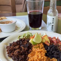 chorizo plate, sikil pak (pumpkin seed dip), jamaica (hibiscus drink), and xni pec hot sauce